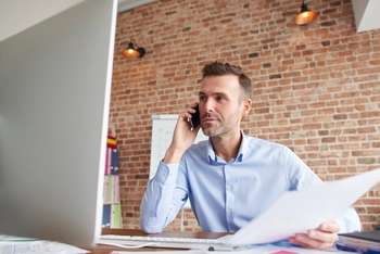 Man focused while working computer