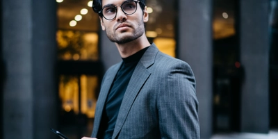 Young businessman leaning on railing and looking a 2023 12 15 17 06 27 utc
