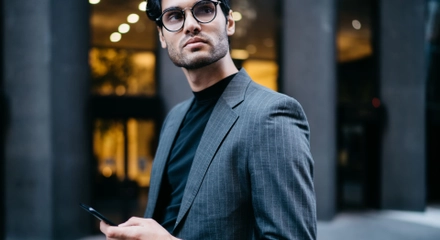 Young businessman leaning on railing and looking a 2023 12 15 17 06 27 utc