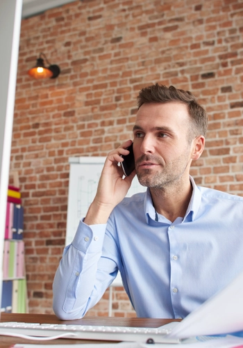 Man focused while working computer