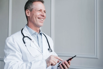 Doctor making phone call