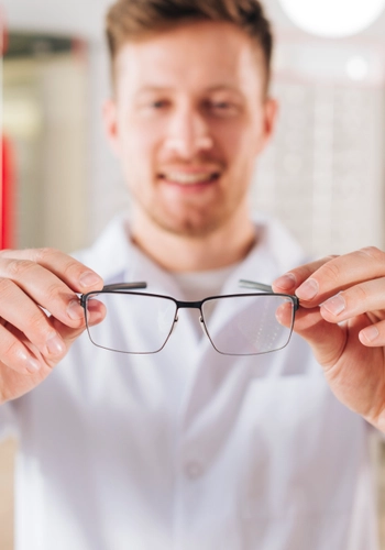 Portrait friendly male optometrist