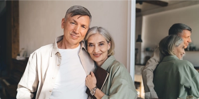 Happy elderly couple hugging in modern room 2024 01 26 18 39 52 utc