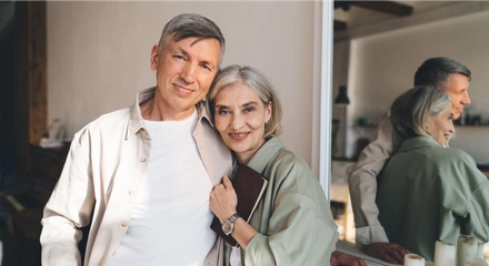 Happy elderly couple hugging in modern room 2024 01 26 18 39 52 utc